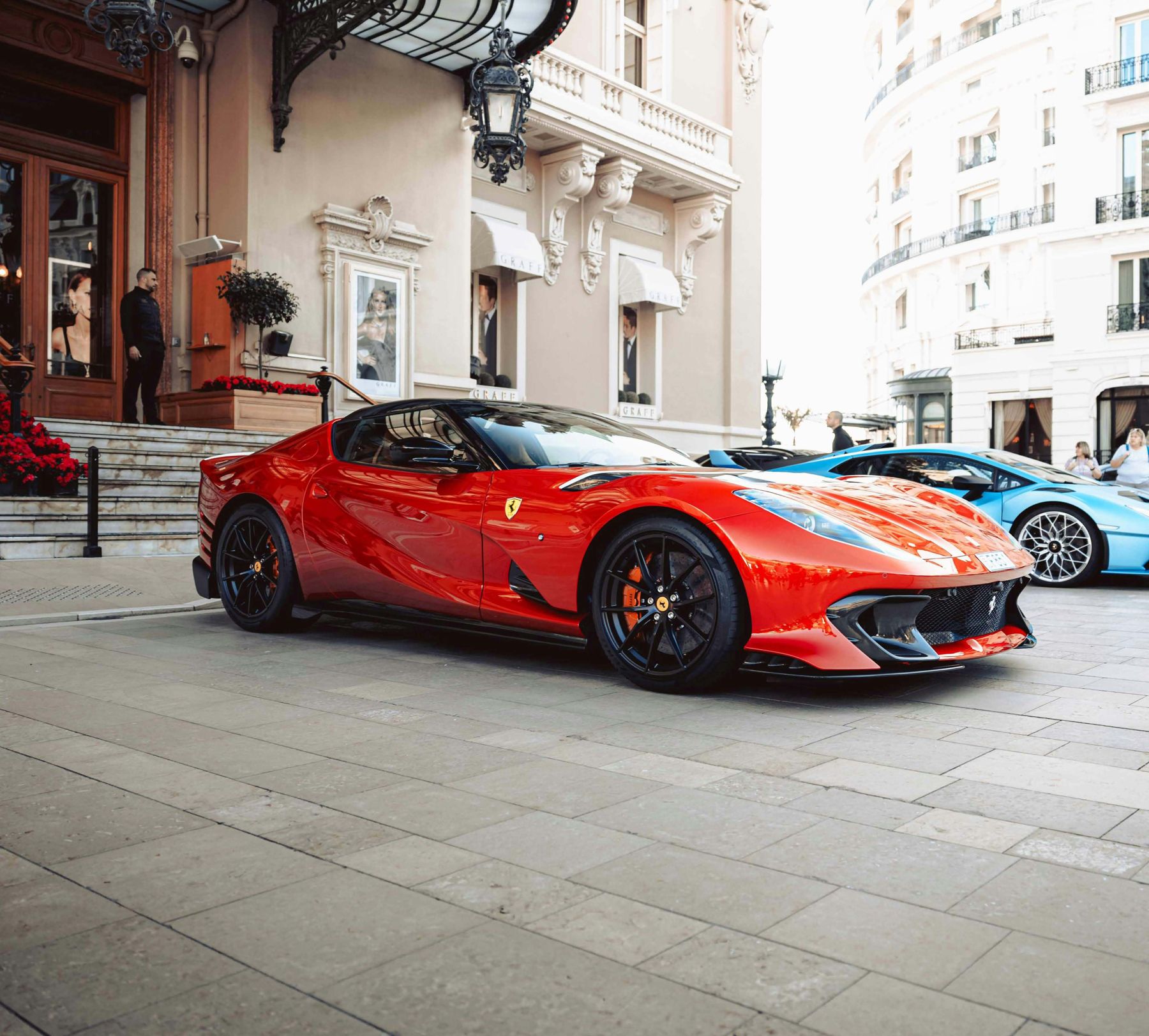 A red Ferrari outside the Casino de Monte-Carlo